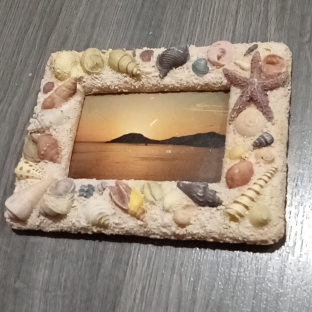 Vintage seashell picture frame with old Kodiak photo (possibly Tofino)